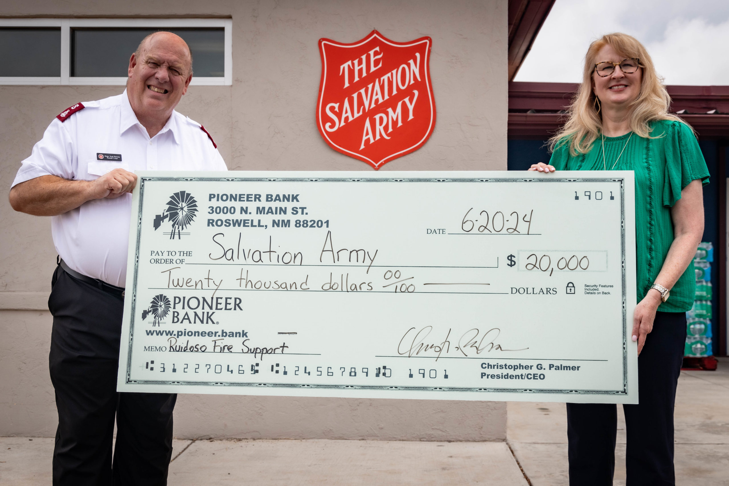 Scott and Nicole with Salvation Army Check